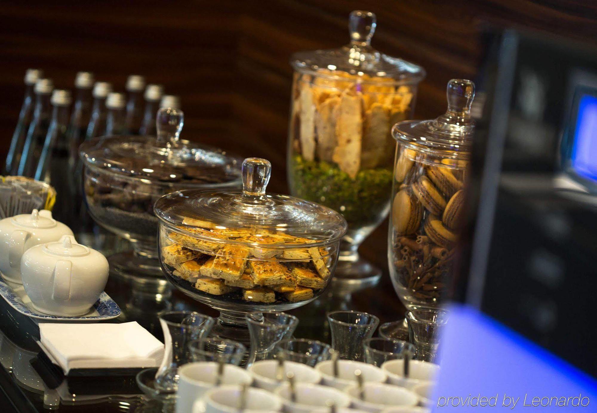 Renaissance Izmir Hotel Exterior photo A selection of garnishes at a bar